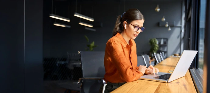 Woman reading from tablet very focused