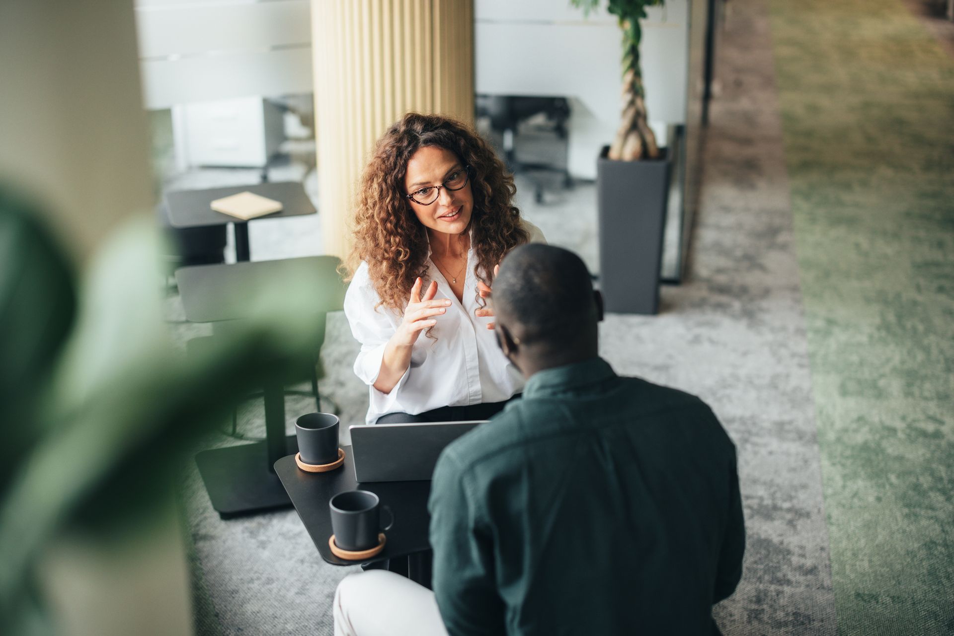 Business discussion between man woman
