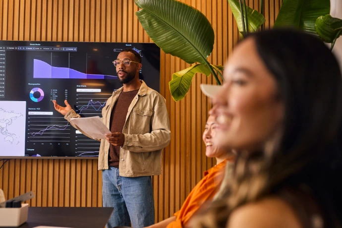 Man presenting in board room